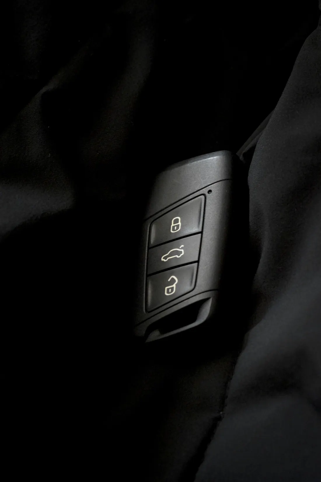 Generic black car remote with lock and unlock buttons, no brand marks